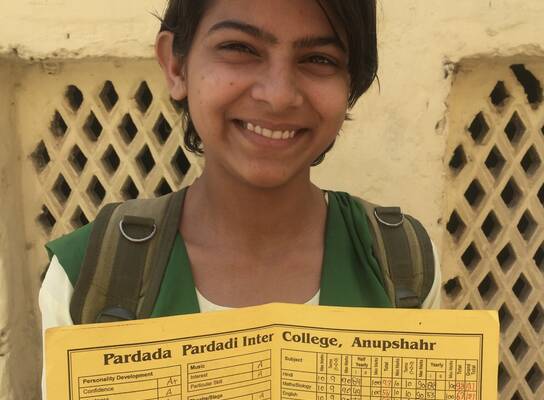 Student with perfect grade card