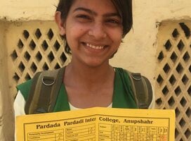 Student with perfect grade card
