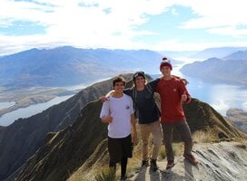Students in front of a beautiful New Zealand mountainscape