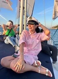 Students enjoying themselves on a sailboat in Lisbon, Portugal