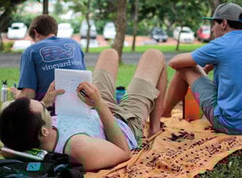 Students studying outdoors on campus