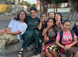 Volunteers with students at the learning center