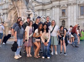 Students in a city square
