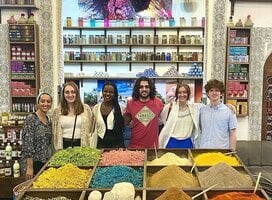 Group of 7 APA Multi-Country students at a spice market in Morocco.