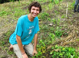 Reforestation Intern Planting Trees