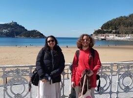Students enjoy the scenic views at Playa de la Concha, San Sebastian