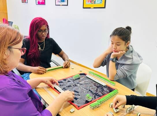 JADE Ambassadors Learning How To Play Majong