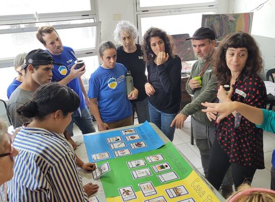 “Community members and ISF Argentina teams during the co-design phase, defining the layout and functions of the future cultural center.