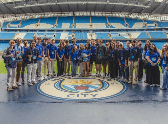Students at the Etihad Stadium