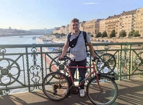 Ben on bike by Danube