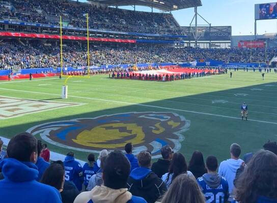 International students attending a football game
