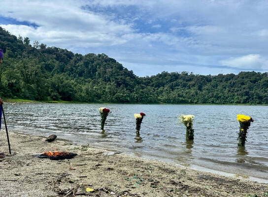 International students discovering the sacred Laguna Chicabal in Guatemala