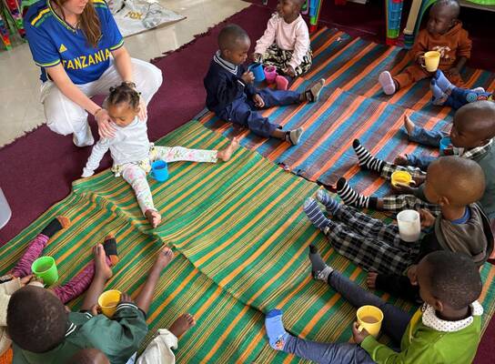 Children learning and playing together at Gily's Children Foundation in Tanzania.