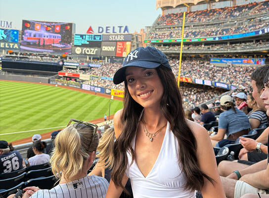 Woman at a baseball game in the USA