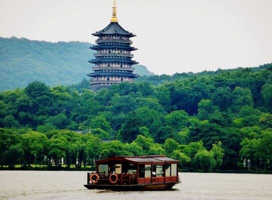 Hangzhou west lake and boat on the water 
