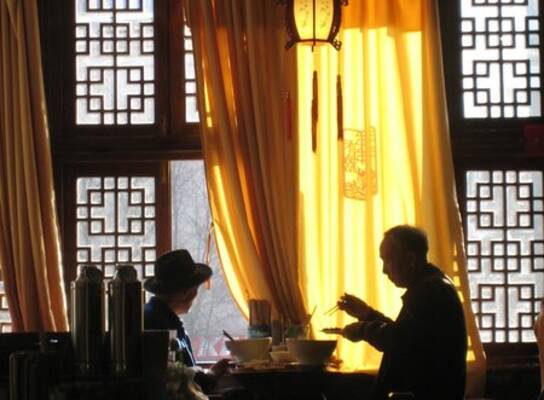 Two men drinking tea