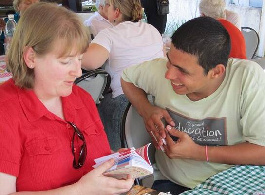 Teach English to youth and adult students.