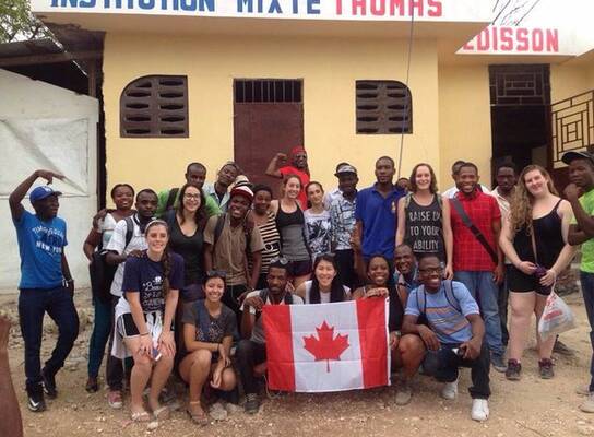 Group of volunteers in front of building
