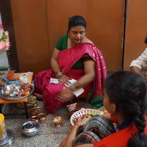 My host family doing puja