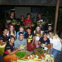 Students making traditional offerings