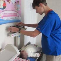 Participant weighting a baby