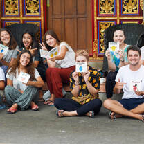 Our volunteers during class break excited for new materials! Volunteering in Bali is fun!