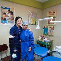 two dentist together in a room