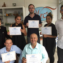 Newly qualified TEFL teachers with their certificates from WECI TEFL