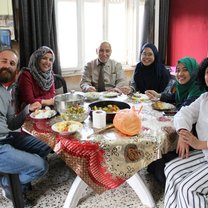 Having dinner together after learning how to cook 