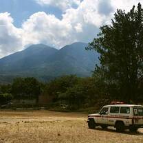 Red Cross Ambulance crossing the field