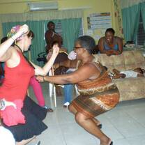 Volunteers and locals dancing Belize