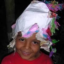 Joshua with a broken pinata on his head
