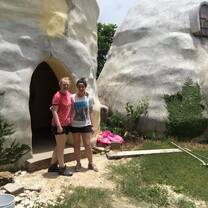 Volunteers outside finished houses Belize