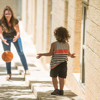 BGU student volunteering with kids in Beer-Sheva