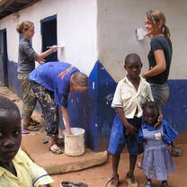 Construction volunteers painting