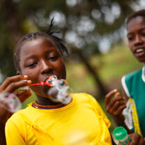 Sierra Leone girl with bubbles