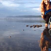 girl with bucket on beach 