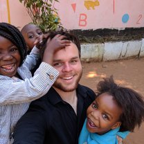 Volunteer with a few of his kids