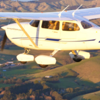 small plane flying over New Zealand