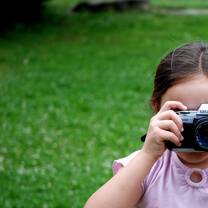 girl taking photo