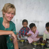 Volunteer and local children India 