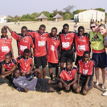 Girls teaching football in Zambia