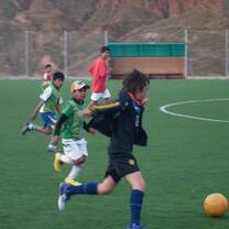 Children playing football Bolivia 