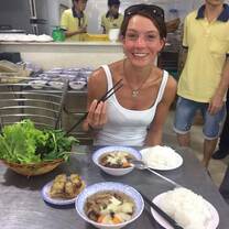 Volunteer enjoying a meal in Vietnam