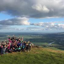 Students in Scottish landscape