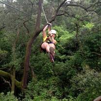Girl ziplining in Costa Rica