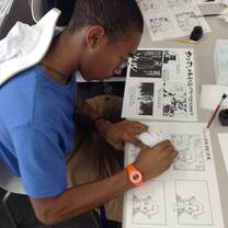 Student drawing anime characters