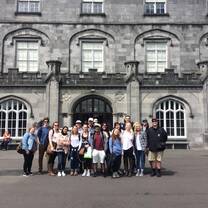 group of students in front of historic building
