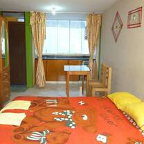 Private room with private bathroom and kitchen space.