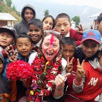 Trek to Teach-er Nicole posing with her students at her goodbye ceremony
